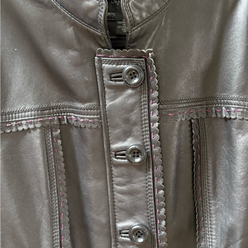 Women’s chocolate-brown colored leather jacket. Great fall jacket.